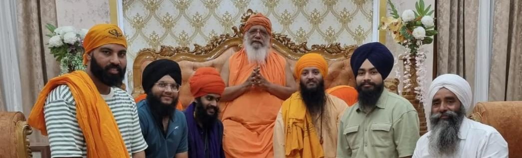 Sangat seated together
