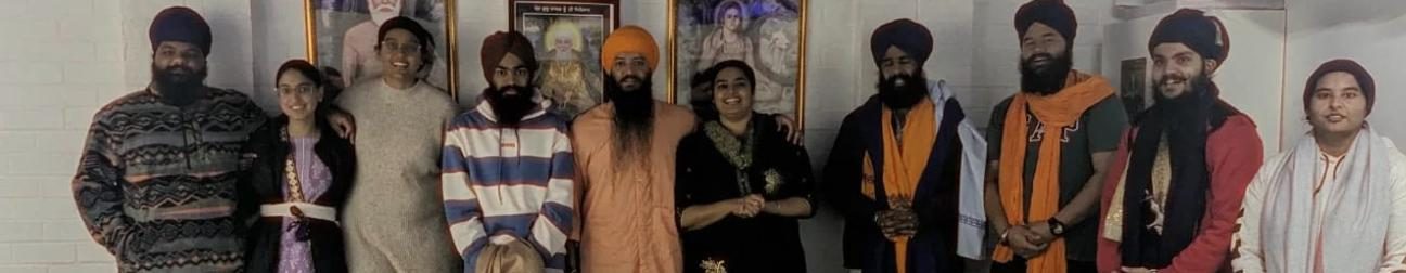 Sangat members standing together